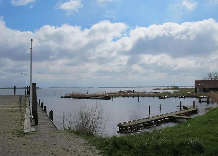 Ferienhaus HET GANZELAND by FeWo-PLAN OOST100 direkt am LAUWERSMEER gelegen